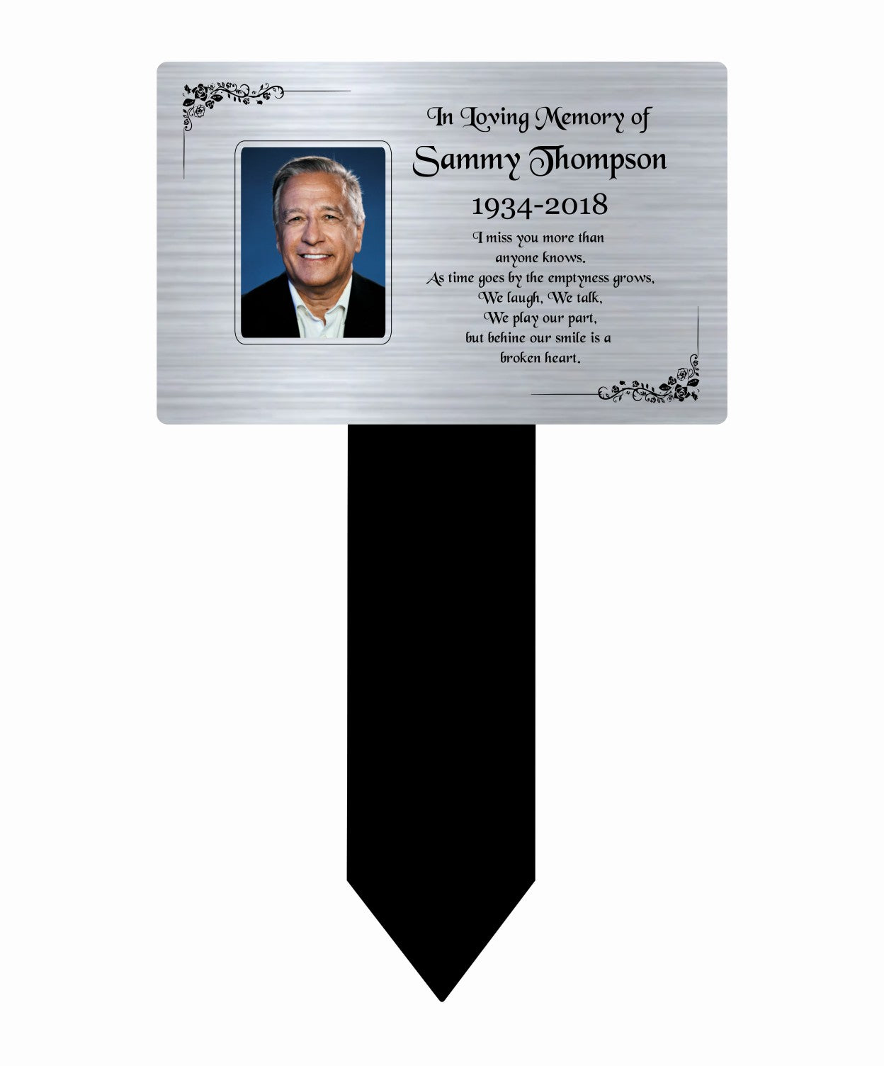 Memorial plaque with a photo of a man and text on a white background