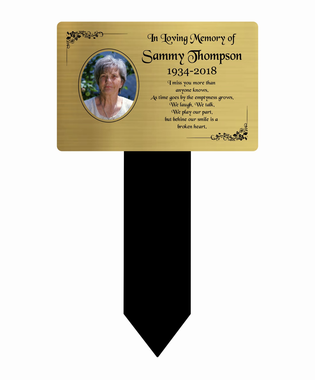 Memorial plaque with a photo of a woman and text 'In Loving Memory of Sammy Thompson 1934-2018' on a white background.