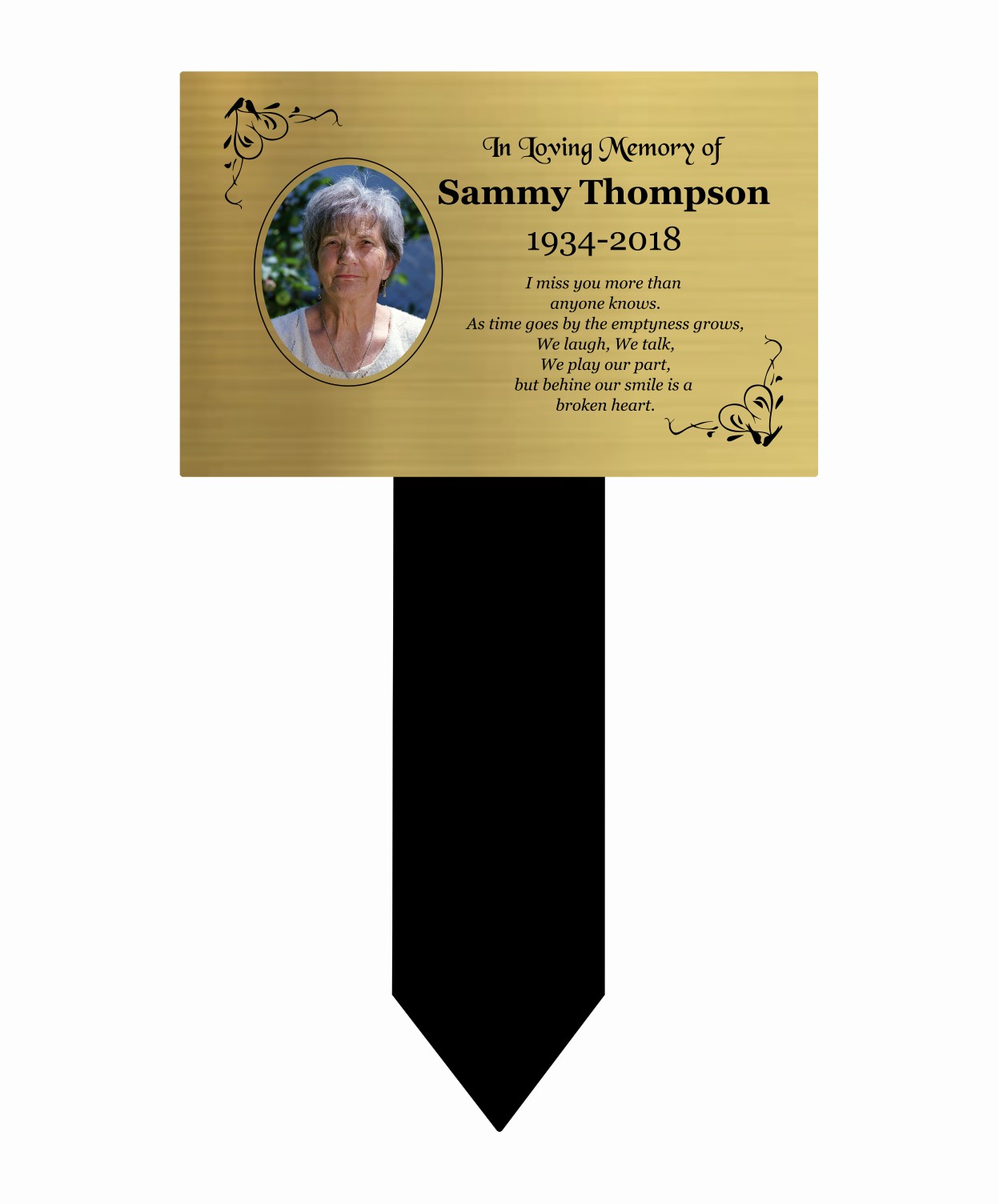Memorial marker with gold plaque and black base for Sammy Thompson, 1934-2018.