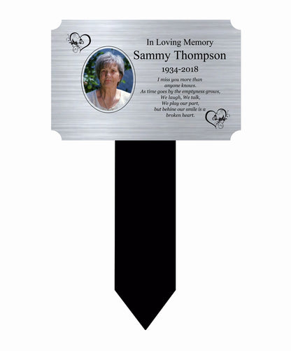 Memorial plaque with a photo of a woman and text 'In Loving Memory Sammy Thompson 1934-2018' on a white background.