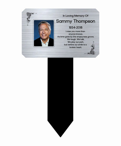 Memorial marker with photo and text 'In Loving Memory Of Sammy Thompson' on a white background