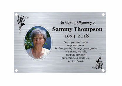 Memorial plaque for Sammy Thompson with a photo and text on a white background