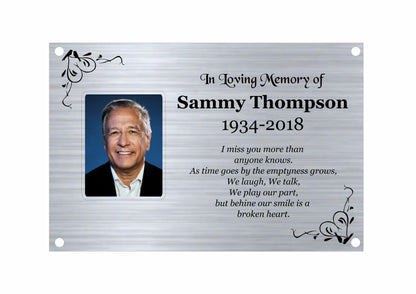 Memorial bench plaque with a photo of Sammy Thompson and a quote about his life.